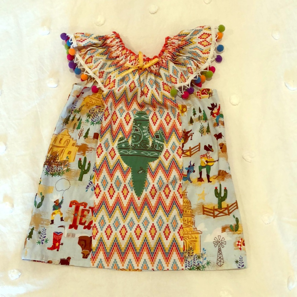 Freckles chicken cactus dress with Pom-poms.